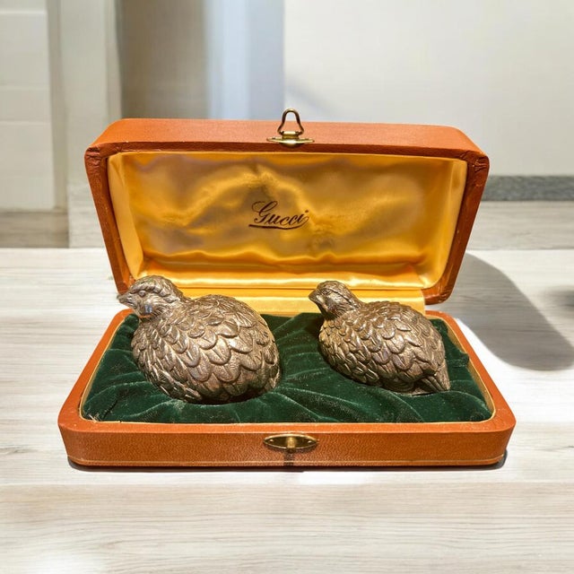 Vintage gucci salt and pepper shakers in the shape of two silver-plated pewter quails with the inscription gucci made in...