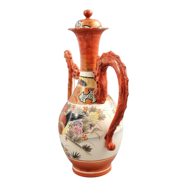 A Japanese Kutani porcelain covered ewer of late 19th century date, combining sculptural form with decorative surface...