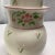 This pretty 1980s Bedside Carafe Set is an almond-colored ceramic with pink and green floral design. The set includes a...