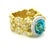 Striking designer cocktail ring by Stambolian, crafted in solid 18 karat yellow gold and centered with a vibrant oval blue...