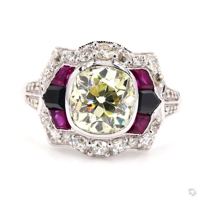 This cocktail ring, an Art Deco design, centers on a 2.47-carat diamond in an old European cut, an early brilliant style...