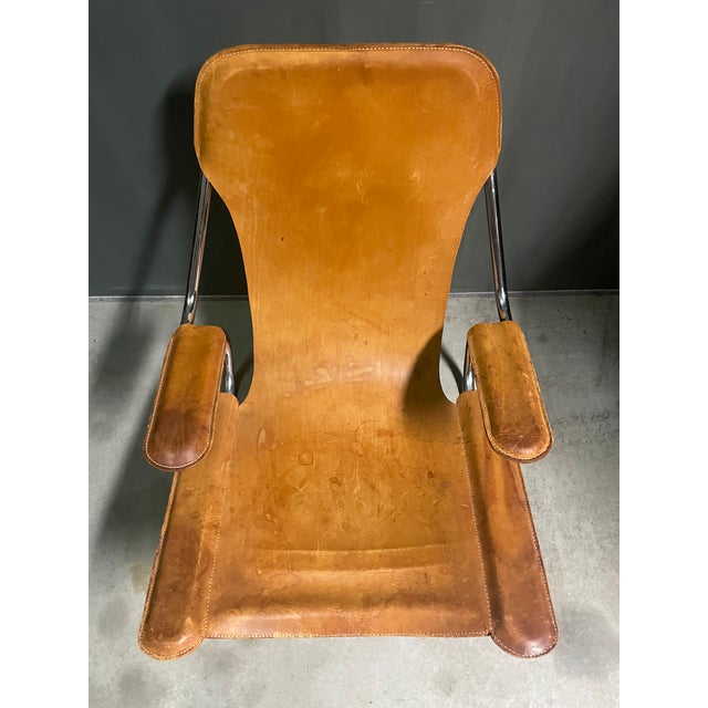 An exceptional very rare chair in great condition. Height, 90 cm, Width70 cm, Depth80 cm