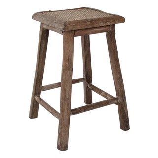 Weathered Brown Wood Stool with Woven Rattan Seat For Sale