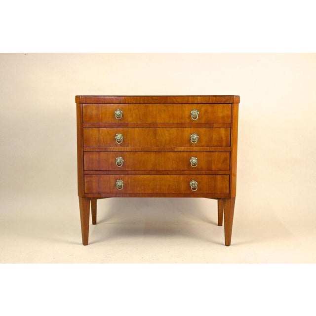 Remarkable, rare 19th century cherrywood Biedermeier chest of drawers from the early period around 1830 in Austria. This...