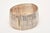 This lovely vintage sterling silver cuff bracelet is hallmarked. It has a weave of linear silver in design form. Light in...