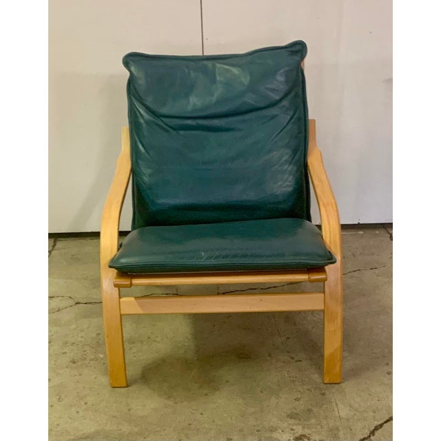 Pair of Danish Modern lounge chairs in bent beech wood gray leather Attributed to Stouby. Unsigned