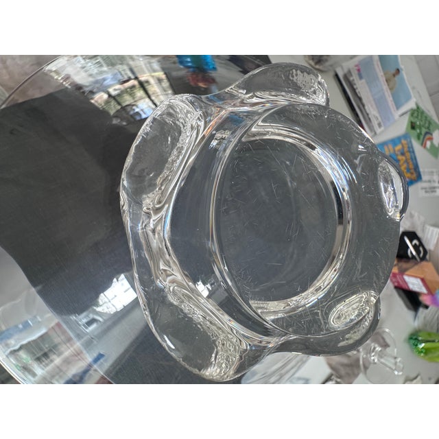 Steuben clear crystal wavy pedestal footed console bowl. This bowl is often atrributed to designer John Dreves from the...