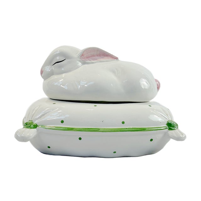 This is a charming vintage Bassano Italian ceramic rabbit trinket box featuring a petite resting bunny atop a softly...