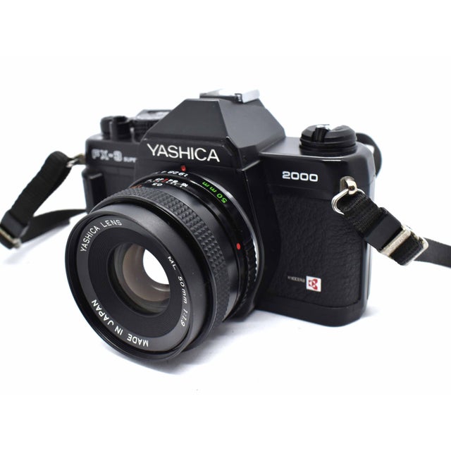 Elevate your interior styling with this Yashica FX-3 Super 2000, a masterclass in mid-century industrial design and...