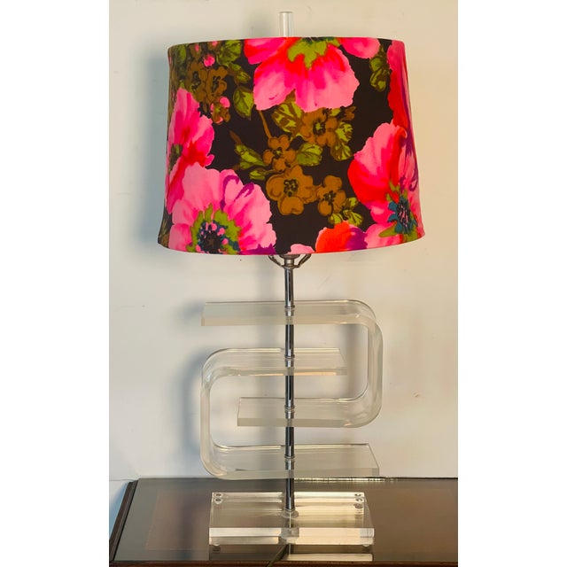 Bright and colorful mid century modern lucite lamp with custom floral shade.