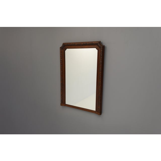 Louis Philippe style mirror with carved oak frame and original plate. Circa 1900.