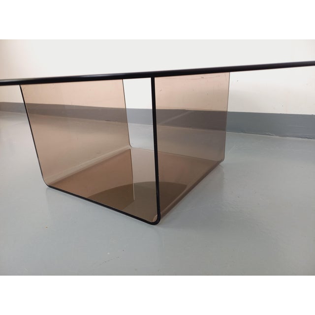 Vintage coffee table from the 70s, Space Age style, round smoked glass top, designer and original smoked acrylic glass...