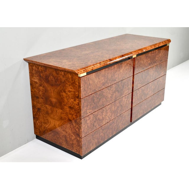 Stunning credenza in Burl with Brass and black details, Italy - 1970's. The Burl has been finished in a high gloss...