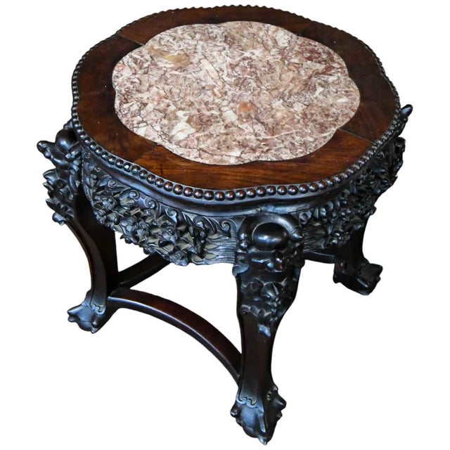 This vintage Chinese Octagon Rosewood Hand-Carved Pink Marble Top Table showcases masterful craftsmanship with its finely...