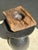 Dark Brown Square Hollow Circular Asian Teak Cup. The natural roughness of the wood (irregularities, holes, rings and...