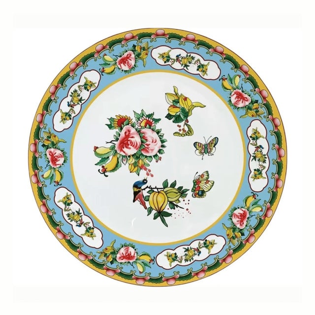 This beautiful 4-piece bone china plate set brings the timeless elegance of Famille Rose porcelain to your modern table....