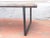 Modern rustic dining table with 2"thick walnut stained pine on sturdy iron minimalist legs with small iron button feet,...