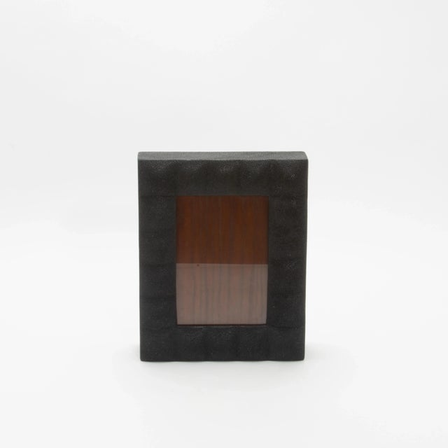 This luxurious picture frame by R&Y Augousti is crafted in their signature quilted black shagreen, exuding both timeless...