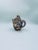 A teapot produced in Japan between the 1930s and 1950s in the opulent Satsuma, Kutania style, crafted from high-quality,...