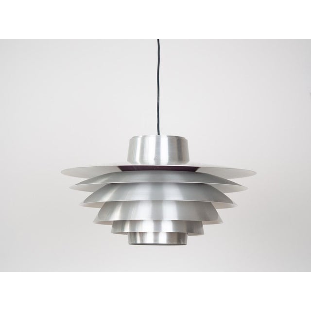 Designed by Svend Middelboe in 1962 and manufactured by Nordisk Solar, this lamp is a jewel of not only Danish but also...