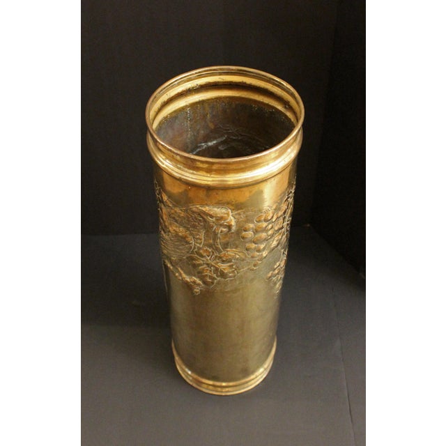Circa 1890s large repousse brass parrot motif stick or umbrella stand. Fine repousse decoration of a large parrot on a...