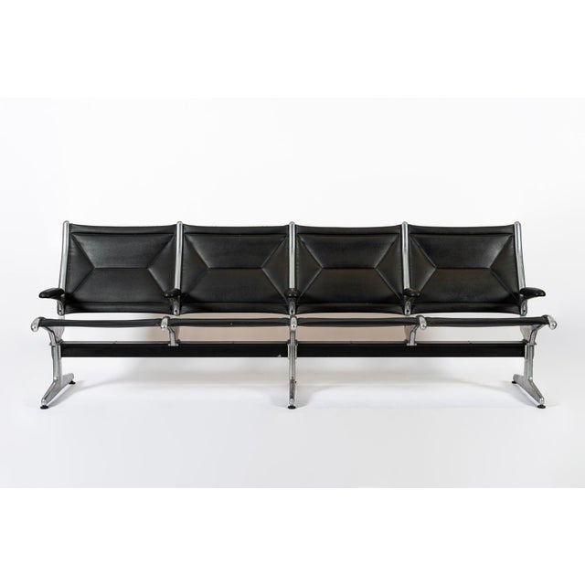 This classic mid century modern Eames Tandem Sling Seat is circa 1990. This stand-alone set features a four-seat...