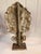 A striking pair of Antique late 20th-century American folk art style pressed papier-mâché mantel garnitures. Designed in...