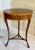 Circa 1810 Walnut Directoire round Table from Lucca, Italy has one drawer and features beautiful pie shaped marquetry. The...