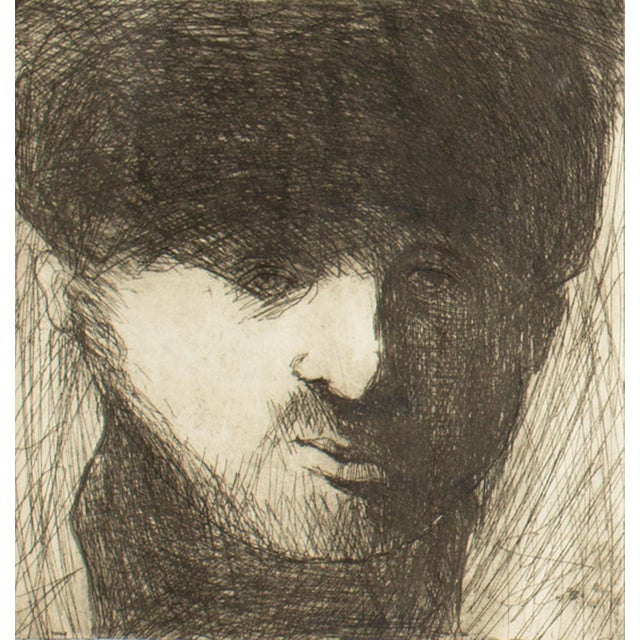 A portrait etching by the American artist James L. Bruch (1942-2023). This portrait depicts a man with beard and mustache...