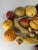 We are selling this great group of twenty pieces of carved alabaster and marble stone fruit. The fruit are mostly well...
