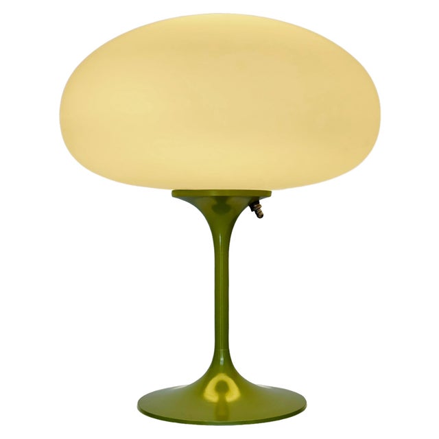 ENJOY FREE CONTINENTAL USA SHIPPING! A sleek stemlite table lamp made by Design Line. It features a cast aluminum main...