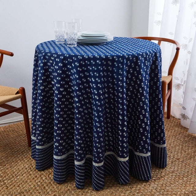 Dramatic and elegant, our Nagina indigo tablecloth instantly creates a table with a story. Layered beneath your finest...