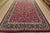 An authentic vintage traditional Mashad rug hand-knotted with fine wool and natural dyes. This rug features an all-over...