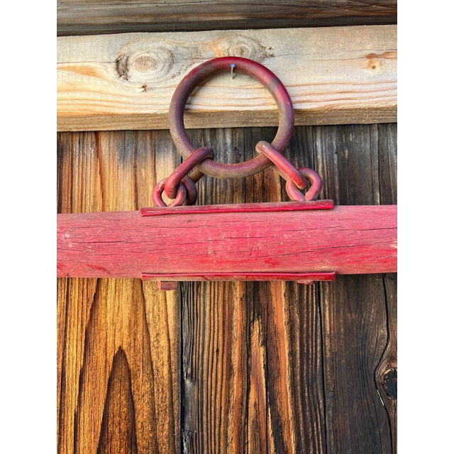 Extra long wooden pole with iron rings and wire. This rustic/industrial piece will add a unique touch to your special...