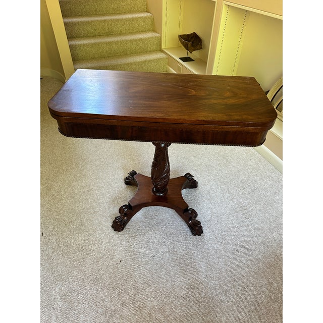 Early 20th Century Mahogany Fold-Over Tea & Game Table With Carved Pedestal and Claw Feet For Sale - Image 4 of 12