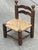 Pretty little, very decorative and practical low chair in oak and straw seat The wood has been treated and waxed, the...