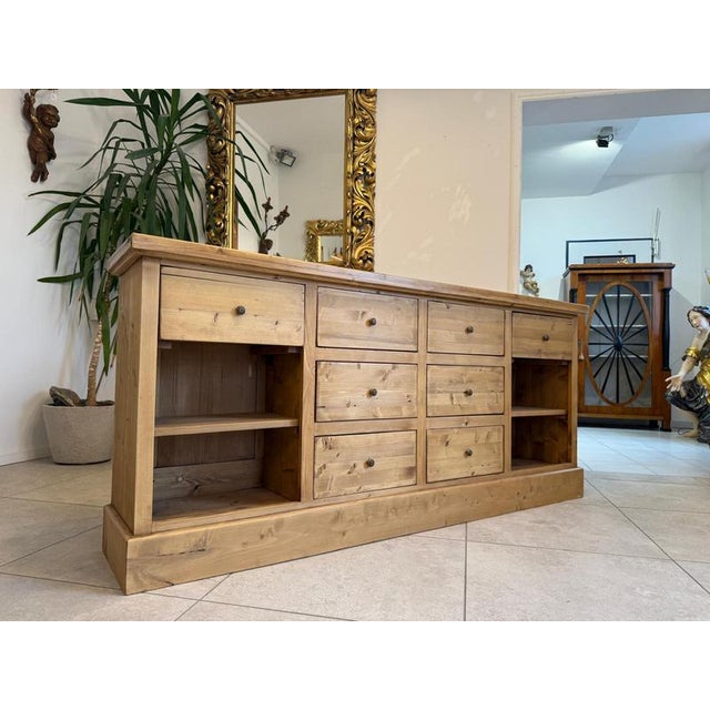 Practical shop chest made of reclaimed wood/softwood. Dimensions: height x width x depth 85 x 190 x 37 cm. Charming,...