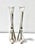 A graceful pair of vintage silverplate bud vases designed as stylized swans, with elongated necks forming the vase...