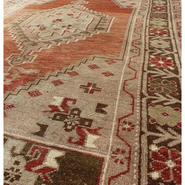 Mid 20th Century Vintage Oushak Rug With Geometric Motifs in Terracotta, Green and Tan For Sale - Image 5 of 7