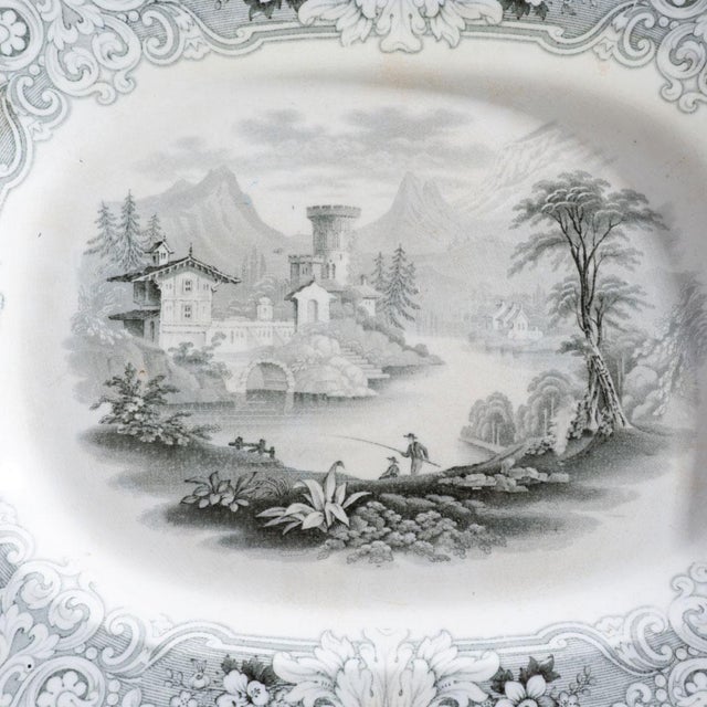 Black transferware platter with metal warming tray. Well-designed piece that has withstood the decades and use. Was...