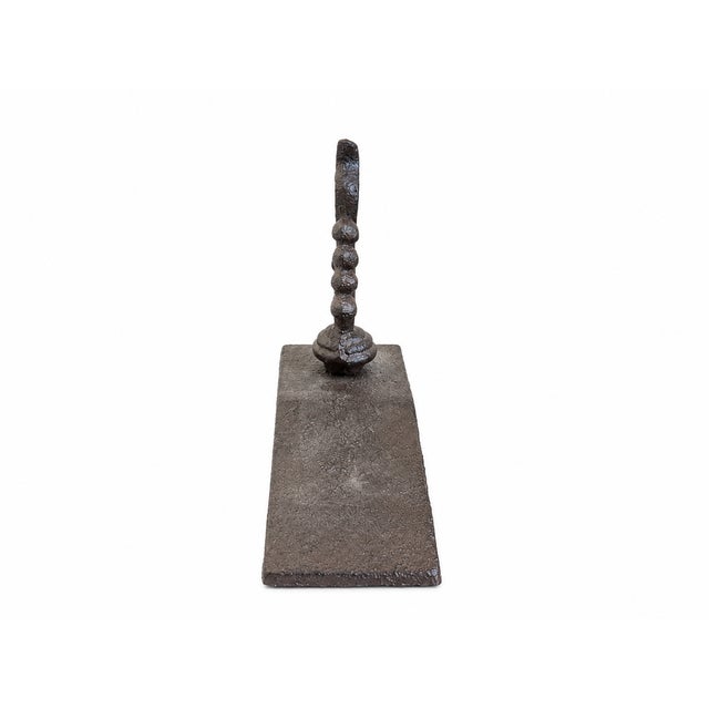 A handsome new wrought iron doorstop from France featuring a substantial wedge-shaped base topped with an ornate scrolling...