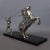 Stunning vintage collectible sculpture, depicting a Roman trainer with 2 horses. Work made of chromed metal on a black...