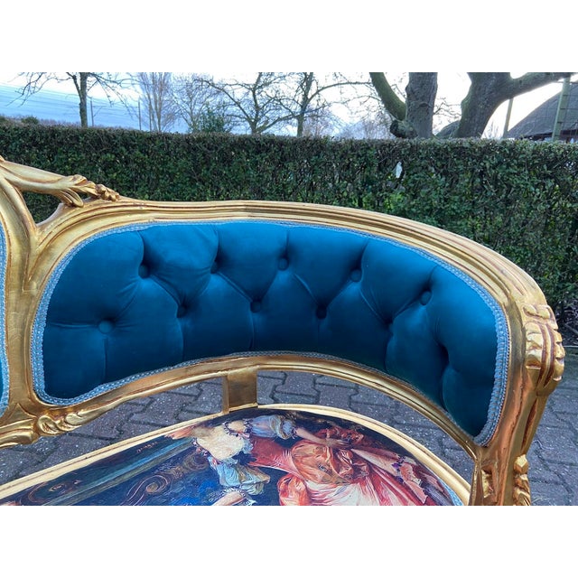 A refined 1980 French Louis XVI–style corbeille settee, beautifully restored and newly upholstered in rich royal blue...