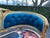 A refined 1980 French Louis XVI–style corbeille settee, beautifully restored and newly upholstered in rich royal blue...