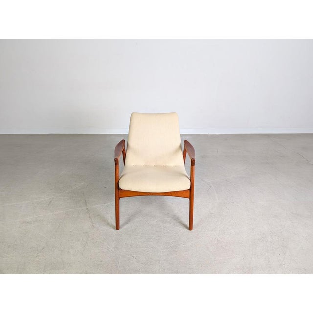 Beautiful and extremely rare Easy Chair by Mogens Kold Møbelfabrik from the 1960s. Designed by Arne Hovmand-Olsen, it...