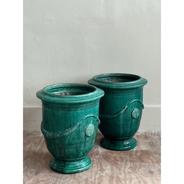 Inspired by the legendary garden urns of Anduze, France, this magnificent pair of vintage planters brings a touch of...