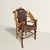 An audacious homage to classic American wilderness craftsmanship, this 20th century Adirondack-inspired armchair feels...