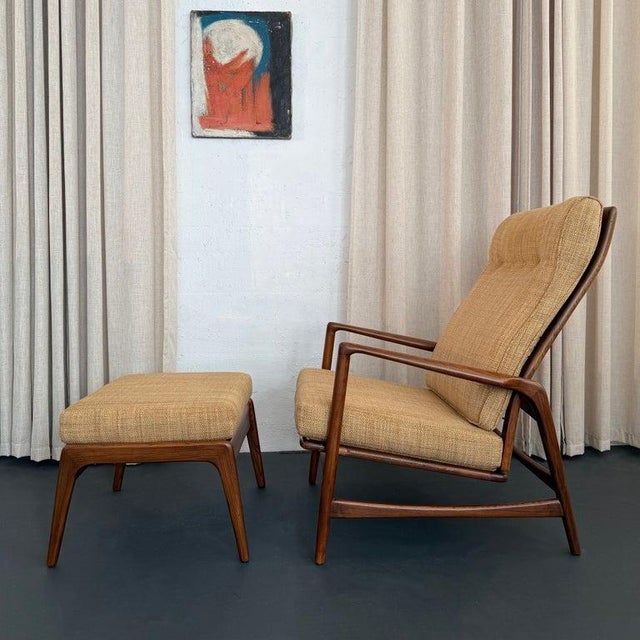 This Scandinavian Modern reclining lounge chair ottoman set was designed by Ib Kofod-Larsen for Selig, circa 1960. The...