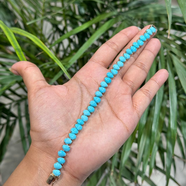 19.77ct Natural Turquoise Pear-Shaped Cabochon Tennis Bracelet 14k Yellow Gold For Sale In New York - Image 6 of 16