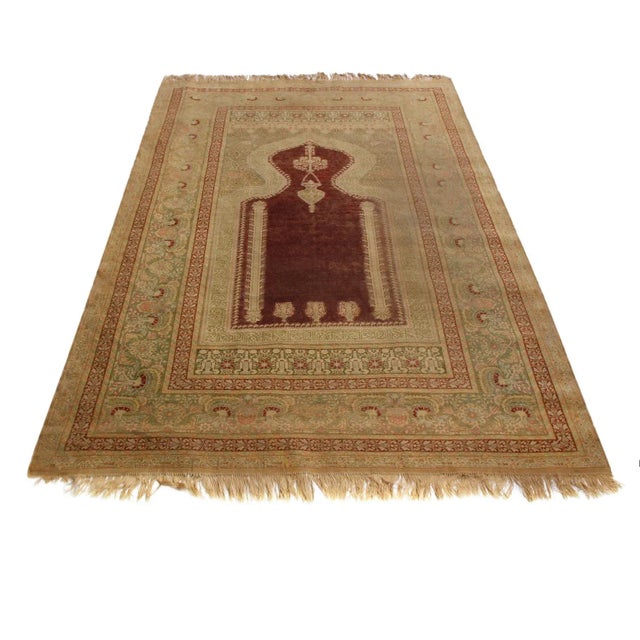 Hand Knotted In High-Quality Wool Originating From Turkey In 1870, This Antique Kayseri Rug Enjoys An Engaging, Rich Shade...